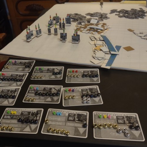 A table strewn with paper standees and homemade cards